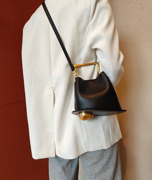 Geometric Artistic Design Metal Handle Leather Bag in Black or White by Sook Stainable