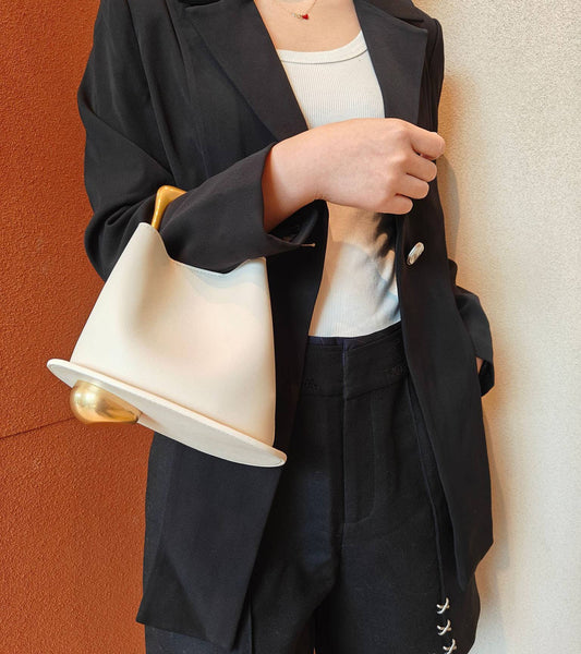 Geometric Artistic Design Metal Handle Leather Bag in Black or White by Sook Stainable