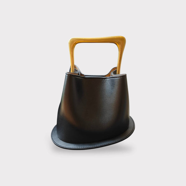 Geometric Artistic Design Metal Handle Leather Bag in Black or White by Sook Stainable