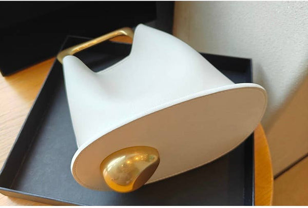 Geometric Artistic Design Metal Handle Leather Bag in Black or White by Sook Stainable
