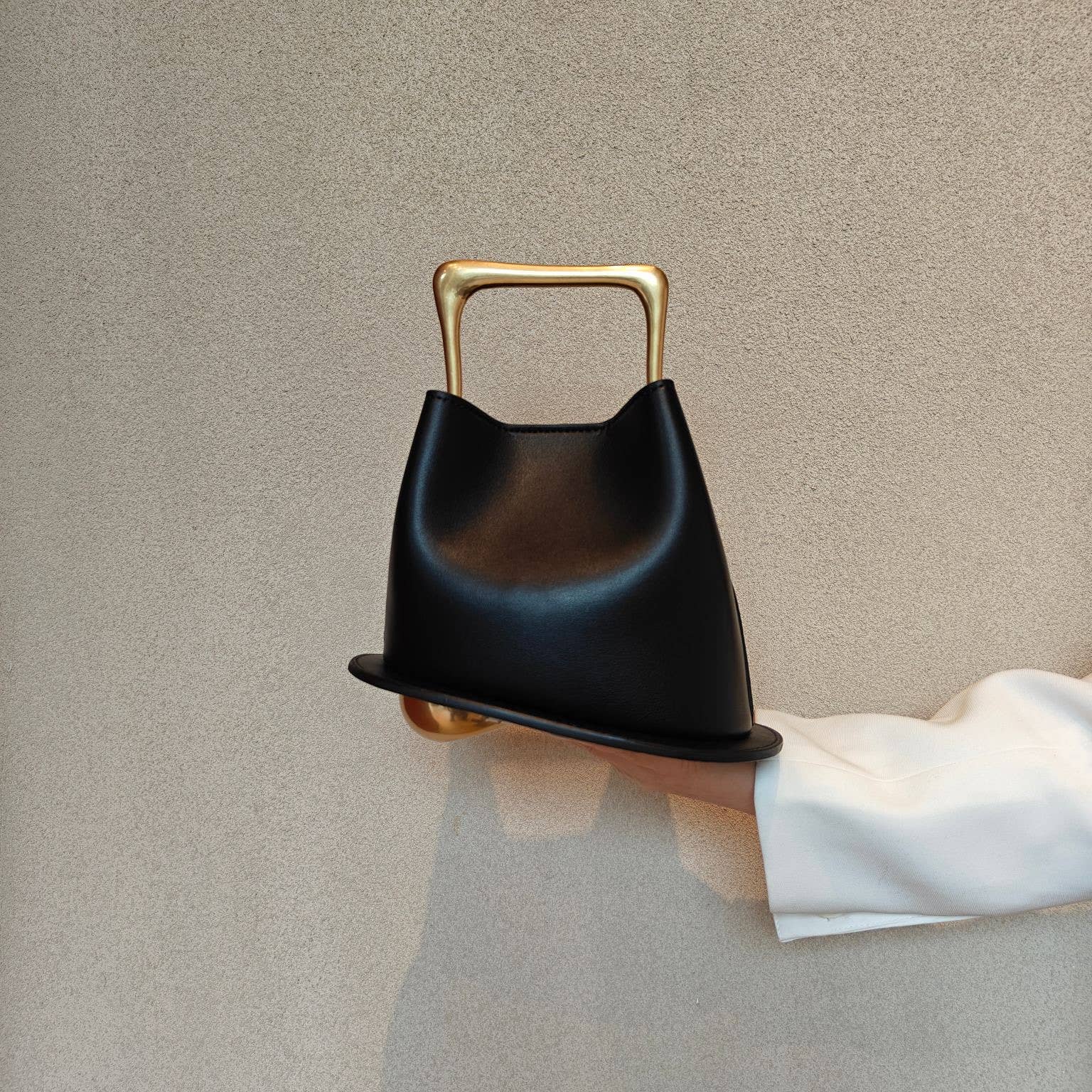 Geometric Artistic Design Metal Handle Leather Bag in Black or White by Sook Stainable