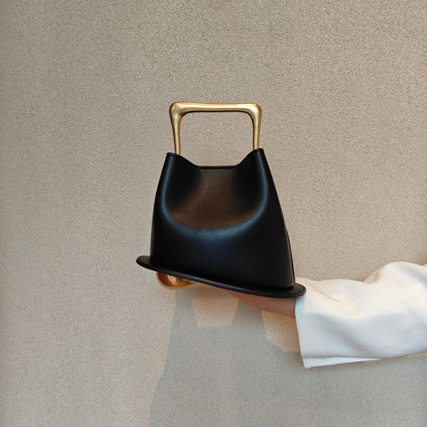 Geometric Artistic Design Metal Handle Leather Bag in Black or White by Sook Stainable