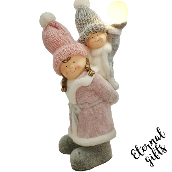 Colly Carries Molly with LED Ball from The Colly & Molly Christmas Collection