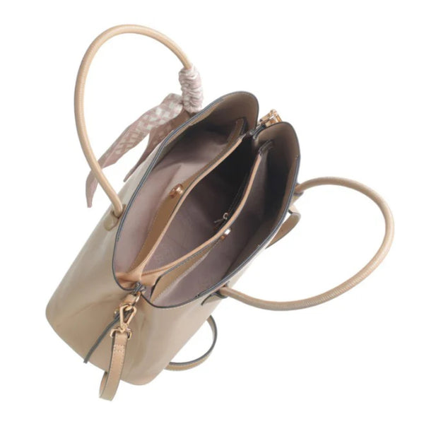 The Clara Handbag in Beige/Taupe by Bessie