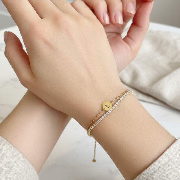 ‘E’ Initial Charm Bracelet in Gold  by Kilkenny Silver