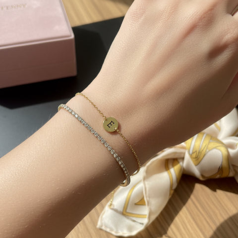 ‘E’ Initial Charm Bracelet in Gold by Kilkenny Silver