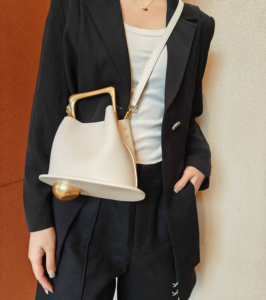 Geometric Artistic Design Metal Handle Leather Bag in Black or White by Sook Stainable