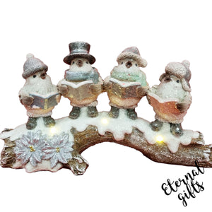 Ceramic Singing Robins on tree stump with LED light